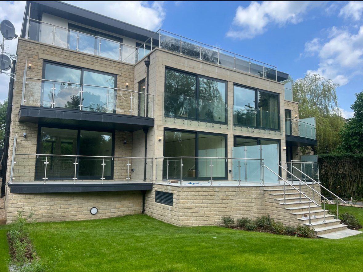 Frameless glass balustrade on a modern UK terrace